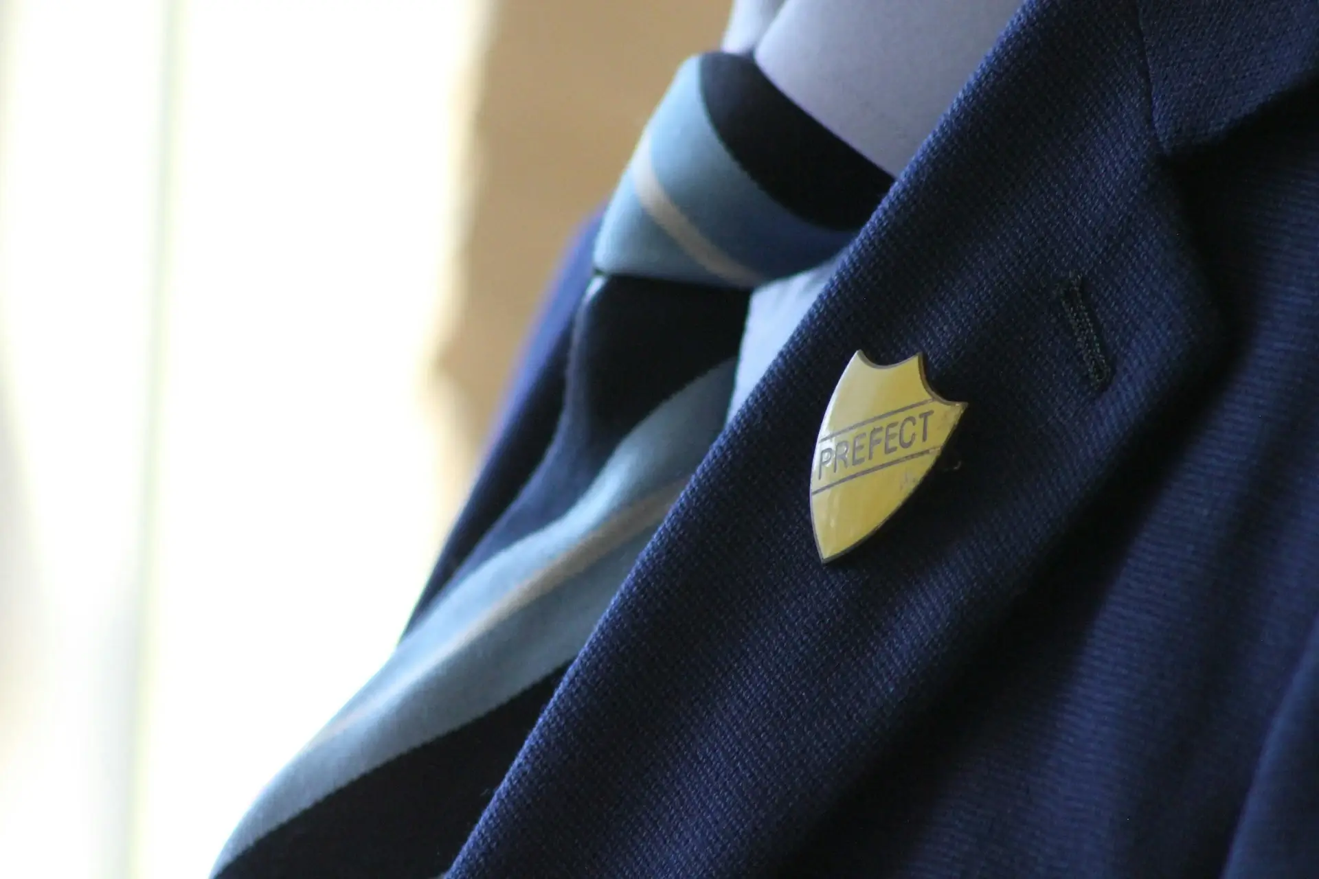 School blazer with prefect badge